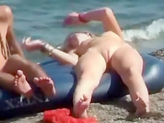 Nude hippie girl on an air mattress