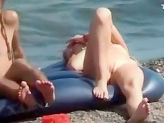 Nude hippie girl on an air mattress