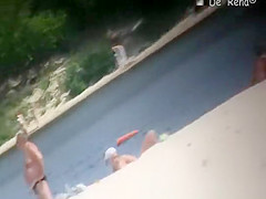 Day at nudist river beach