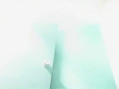 Pale mature woman in the pool's cabin