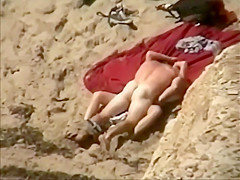 Voyeur spies sex from the cliffs