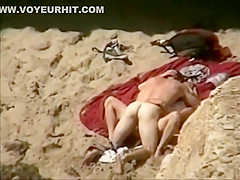 Voyeur spies sex from the cliffs