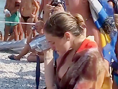 Video shots from a crowded nudist beach