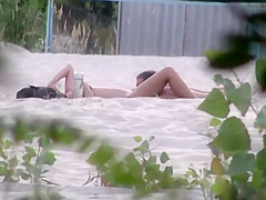 Beach pussy licking spied by a voyeur
