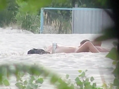 Beach pussy licking spied by a voyeur