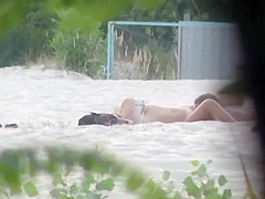 Beach pussy licking spied by a voyeur