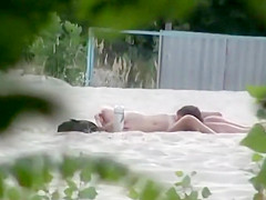 Beach pussy licking spied by a voyeur