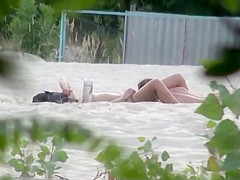 Beach pussy licking spied by a voyeur