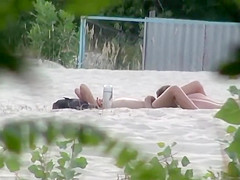 Beach pussy licking spied by a voyeur