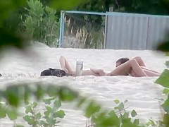 Beach pussy licking spied by a voyeur