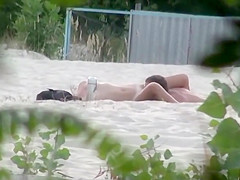 Beach pussy licking spied by a voyeur