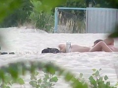 Beach pussy licking spied by a voyeur