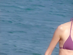 Pretty girl spied on the beach
