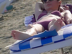 Pretty girl spied on the beach