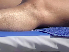 Pretty girl spied on the beach