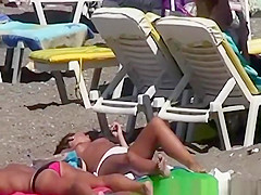 Topless women enjoying the sun
