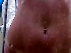 Girl spied in beach cabin showering