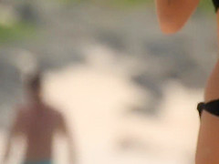 Massive natural tits on a beach