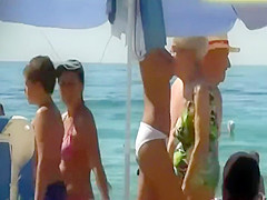 Sexy topless girl in a white bikini