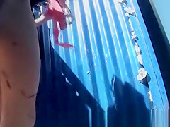 Girl dresses in pink swimsuit