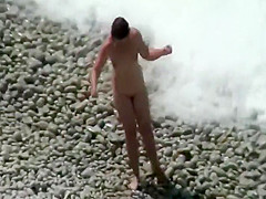 Pretty woman spied on the beach