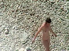 Pretty woman spied on the beach