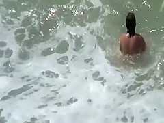Pretty woman spied on the beach