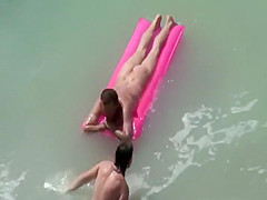 Pretty woman spied on the beach