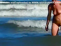 Hot body of an older woman in the water