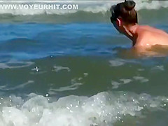 Hot body of an older woman in the water