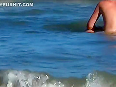 Hot body of an older woman in the water