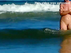 Hot body of an older woman in the water