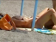 Spy as a woman gets her pussy fingered
