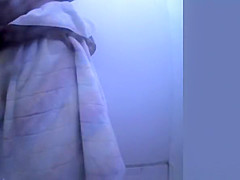 Short hair blonde with small boobs spied in beach cabin