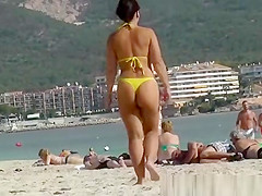 Sexy ass woman in yellow thong bikini