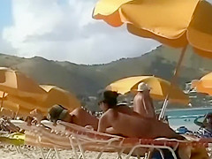 Sweet fake boobs on a beach