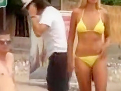 Serbian folk singer spied on a beach