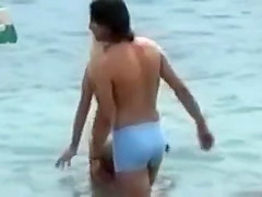 Serbian folk singer spied on a beach