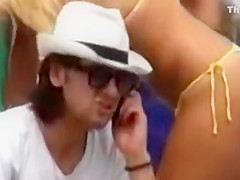 Serbian folk singer spied on a beach