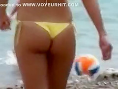 Serbian folk singer spied on a beach