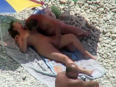 Nudist caresses his wife