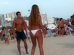 Girl with a fantastic ass plays volleyball
