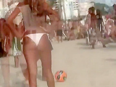 Girl with a fantastic ass plays volleyball