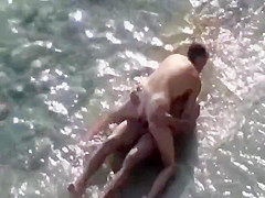 Couple fucking in the shallow water
