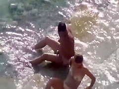 Couple fucking in the shallow water