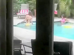 Teenage girls peeped topless at a pool