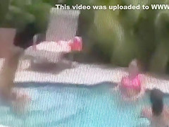 Teenage girls peeped topless at a pool
