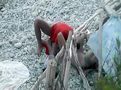 Horny couple spied on a beach