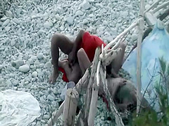 Horny couple spied on a beach