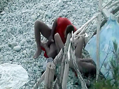 Horny couple spied on a beach